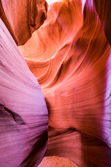 Antelope Canyon in the Navajo Reservation Page Northern Arizona. Famous slot canyon. Light showing off the glamorous detail of the ancient spiral rock arches.