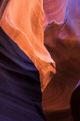 Upper Antelope Canyon in the Navajo Reservation Page Northern Arizona. Famous slot canyon. Light showing off the glamorous detail of the ancient spiral rock arches. Multicolored texture.