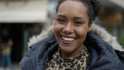 African american woman smiling confident standing at street