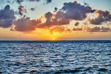 Obraz premium Sunrise on a Canal leading into the Ocean