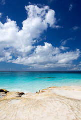 Half Moon Cay Island Clouds And Colorful Waters