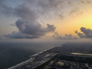 An aerial image of the city of Lekki, Lagos showing the coast line - obrazy, fototapety, plakaty