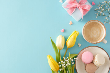 Women's Day atmosphere concept. Top view photo of gift box cup of coffee plate with macaroons small...