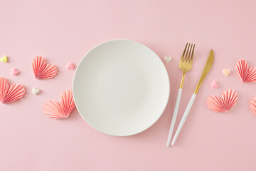 Women's Day celebration concept. Top view photo of empty white plate cutlery knife fork and pink...