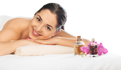 Beautiful and healthy woman relaxing in spa salon