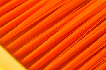 Orange fibers from a floor sweeper can be used as a background