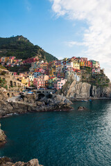 Naklejka premium Colorful medieval town on the rocks - Manarola. Cinque Terre National Park in winter. Italian towns.