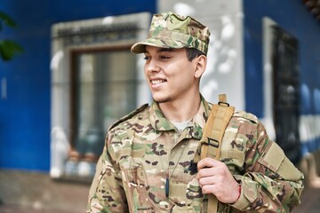 Young man army soldier smiling confident standing at street