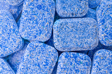 Blue dishwasher capsules close-up. selective focus