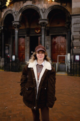 Fototapeta premium Young beautiful tourist woman in Amsterdam.