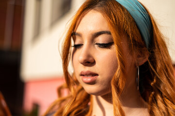 Close up portrait of a girl with orange hair