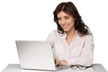 Beautiful businesswoman using laptop isolated on white