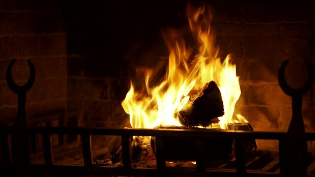 Antique fireplace at night. Close up. 4k video