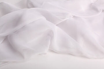 Art white beige wave fabric silk. Abstract texture horizontal copy space background.