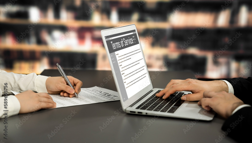 Poster online term of service conditions showing astute rules and regulations in using the website on a lap