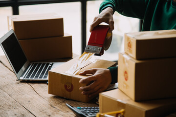 SME entrepreneur Small business entrepreneurs Online selling ideas,Happy Young Asian business owner...