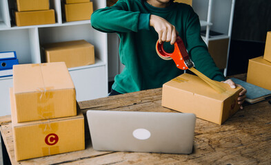 SME entrepreneur Small business entrepreneurs Online selling ideas,Happy Young Asian business owner...