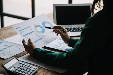 Business Documents, Auditor businesswoman checking searching document legal prepare paperwork or report for analysis TAX time,accountant Documents data contract partner deal in workplace office