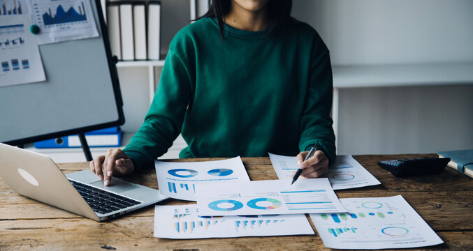 Business Documents, Auditor businesswoman checking searching document legal prepare paperwork or report for analysis TAX time,accountant Documents data contract partner deal in workplace office