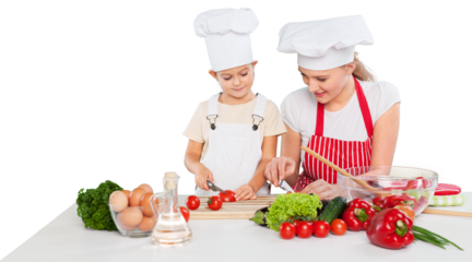 Portrait of adorable little girl and her mother cooking together