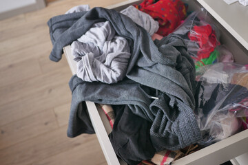 rawer with messy cloths top view ,
