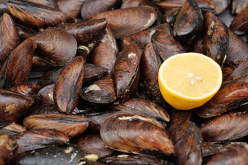 Thai mussels in metal on table top view 