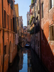 Obraz na płótnie Canvas A narrow canal of Venice