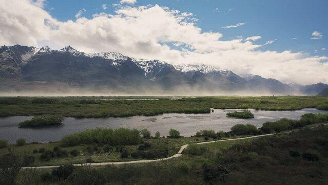 Lake side in Glenorchy, New Zealand. Strong gust of wind full of dust timelapse