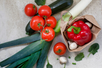 various vegetables over grey stone background