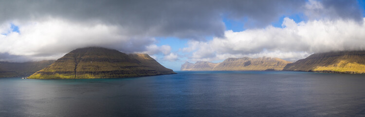 Fototapeta na wymiar Leirviksfjørður panorama, looking at the south of Kalsoy island with Borðoy island on the right
