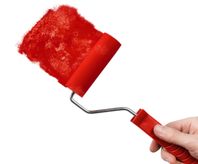 Hand draws with red paint using a red roller brush, cut out