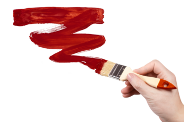 Hand draws with red paint using a thick brush, cut out