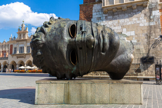 Eros Bendato (Eros bound) giant head statue in Krakow, Poland