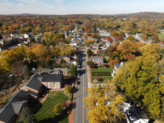 Aerial view of a cluster of houses in a small town in the state of Virginia USA shot by a drone