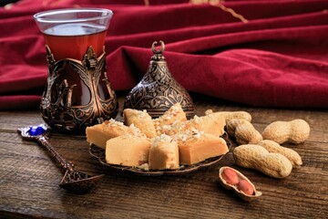 Easter classic Arabian sweet halva and tea on the desk