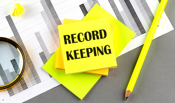 RECORD KEEPING text on sticky on sticky on chart with pen