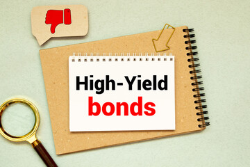 Business concept. text on a sticker on the table. view from above- high yield bonds