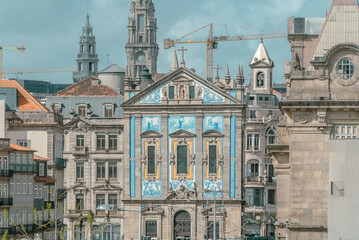 Fototapeta na wymiar Oporto, Portugal. April 12 , 2022: Church of the azulejos congregados and blue sky.