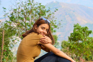Happy cheerful latin teenage girl outside in Guatemala