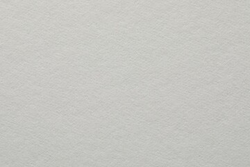 Texture of white paper sheet as background, closeup
