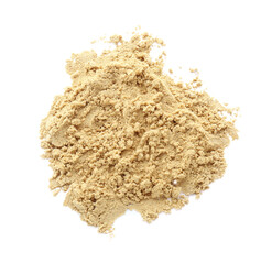 Heap of aromatic mustard powder on white background, top view