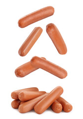 Fresh raw sausages falling on white background