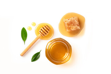 Honey jar with honey comb isolated on white background. Top view
