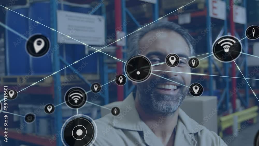 Poster Animation of connected icons over smiling biracial man standing arms crossed in warehouse