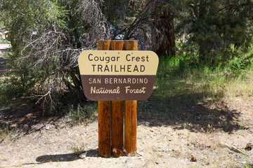 The Cougar Crest Trailhead, San Bernardino National Forest wooden sign at the entrance to the trail at the Discovery Center in Big Bear, California.