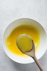 Eggs, Melted butter and sugar that have been mixed together, process of making muffins