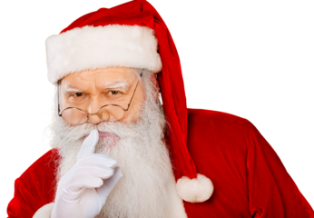 Portrait of smiling santa claus showing silence sign on  background