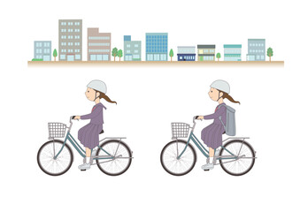 街並みを背に自転車に乗る女子学生