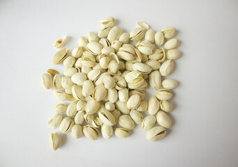 Pistachios isolated on white background, top view. 