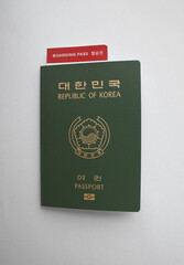 Republic of Korea passport and boarding pass isolated white background.